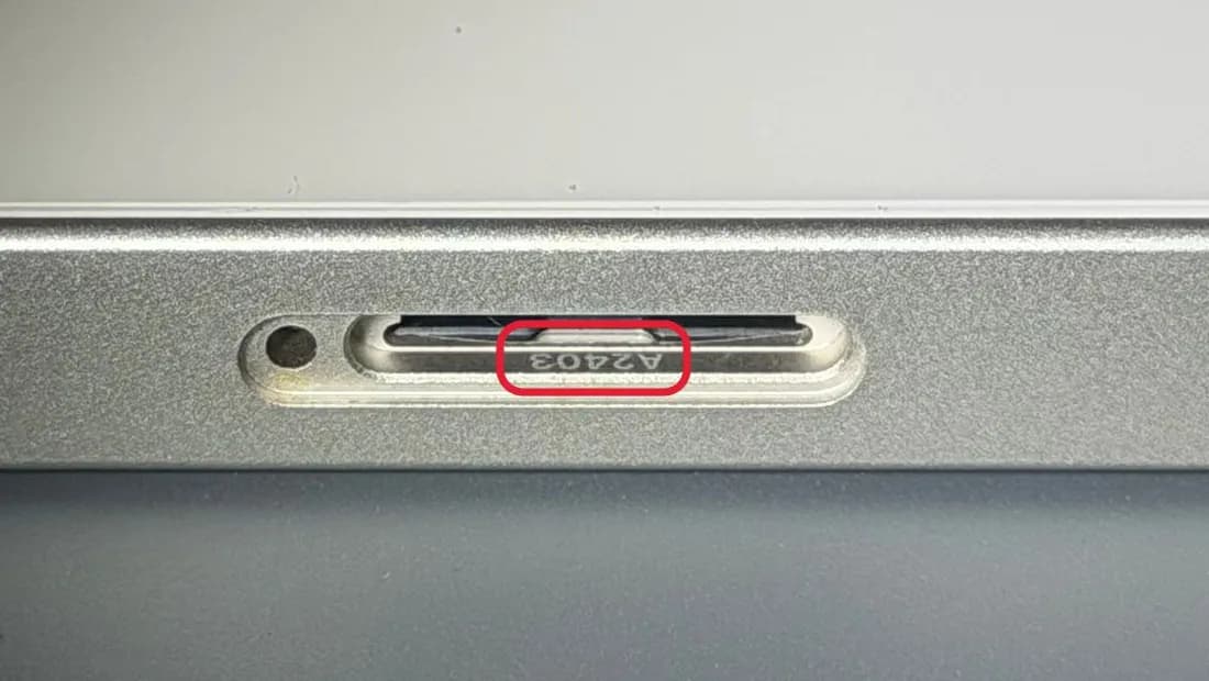 SIM tray slot with the number A2403 highlighted inside